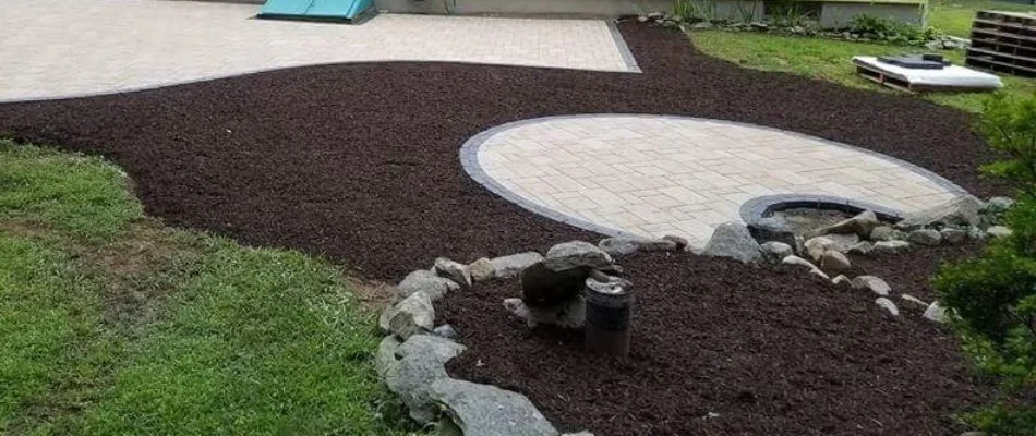 Mulch around a patio in Groton, CT.