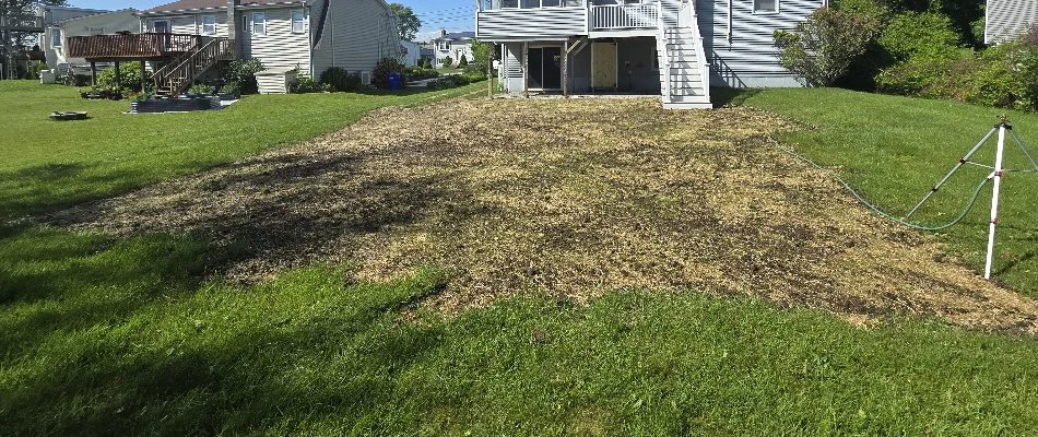 Regrading for a backyard in Groton, CT.