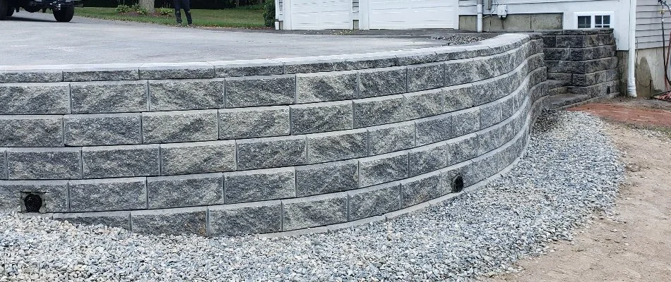 Retaining wall in Groton, CT, with weep holes.