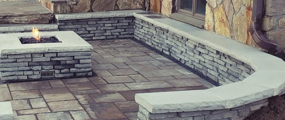 Seating wall around a fire pit in Groton, CT.